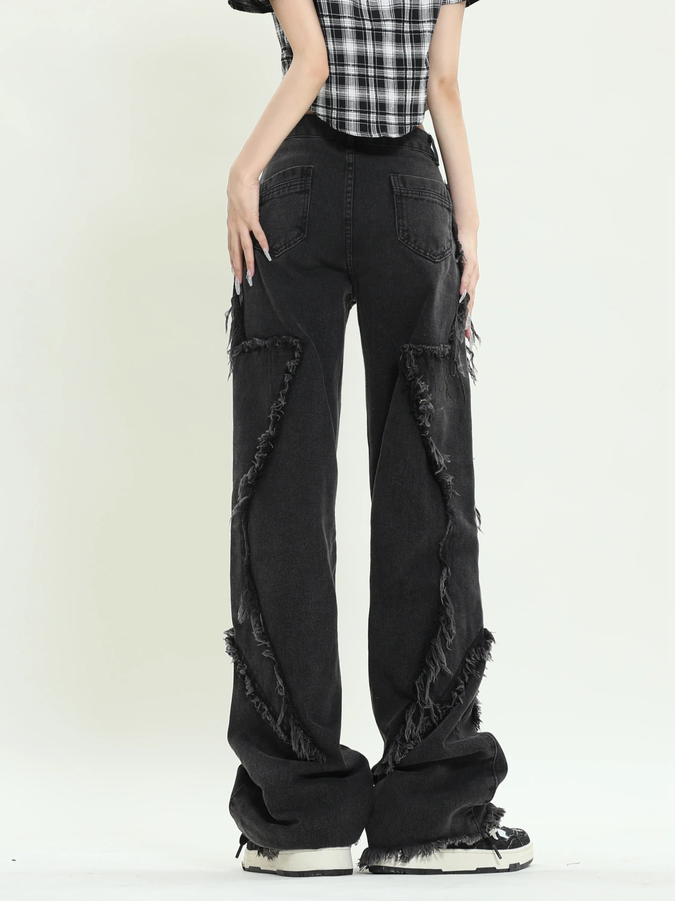 Sorte løse jeans med stjernedesign