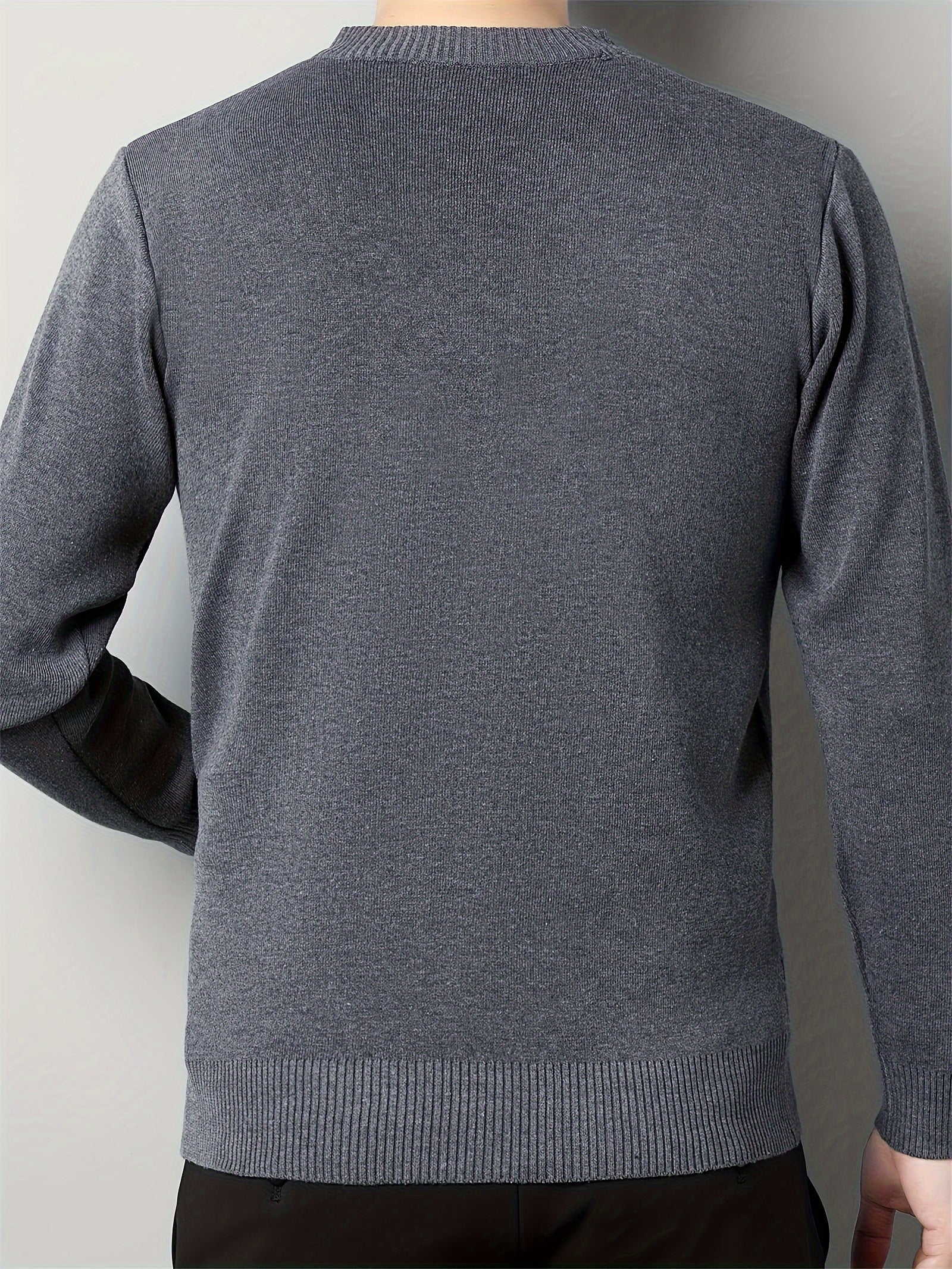 Strikket sweater med geometrisk mønster
